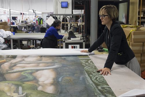 ZACHARY PRONG / WINNIPEG FREE PRESS  Alex Vanderhooft looks at a reproduction of artwork from the Sistine Chapel at Valley Fashions on Wednesday, June 1, 2016.