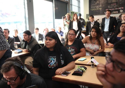 RUTH BONNEVILLE / WINNIPEG FREE PRESS  High School students from Children of the Earth School listens to Prime Minister Justin Trudeau being interviewed by WFP Editor Paul Samyn while video taping it on his phone at the Winnipeg Free Press News Cafe Thursday.  June 02 / 2016