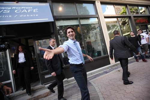 RUTH BONNEVILLE / WINNIPEG FREE PRESS  Prime Minister Justin Trudeau goes to shake photos hand as he leaves the Winnipeg Free Press News Cafe where he was nterviewed by WFP editor Paul Samyn and meeting students from Children of the Earth high school Thursday.  June 02 / 2016