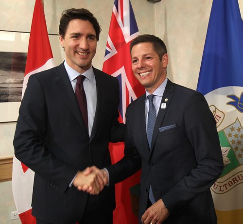 JOE BRYKSA / WINNIPEG FREE PRESS  Winnipeg Mayor Brian Bowman, right, hosting the Federation of Canadian Municipalities Big City Mayors Conference at the RBC Convention Centre in Winnipeg greets Prime Minister Justin Trudeau Friday morning .-June 03 , 2016.(See Aldo Santin  story)