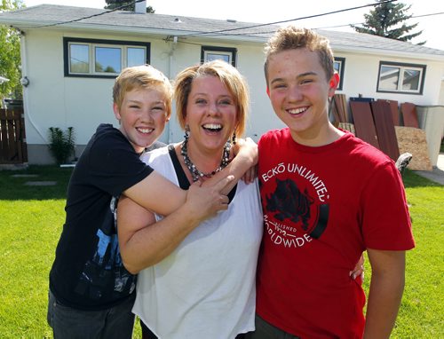 BORIS MINKEVICH / WINNIPEG FREE PRESS Harder family: Melissa (mother, centre), and two sons,  L and R, Joshua and Joel. Or shot of both boys. Both boys are going to summer camp with the financial help of the charity, Sunshine Fund. Through donations and grants, the charity enables kids to attend summer camp, who wouldnt be able to otherwise. This allows them to experience many camp activities for the first time.. June 2, 2016.
