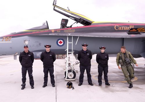 ZACHARY PRONG / WINNIPEG FREE PRESS  A CF-18  Hornet demo crew prepare for a practice flight at Southport Airfield on June 3, 2016. From L-R; Sgt. Robert Gregory McNeil, MCpl Evan Burchell, Cpl Tyson Browett, Cpl Alexandra Lampard and Captain Ryan Kean.