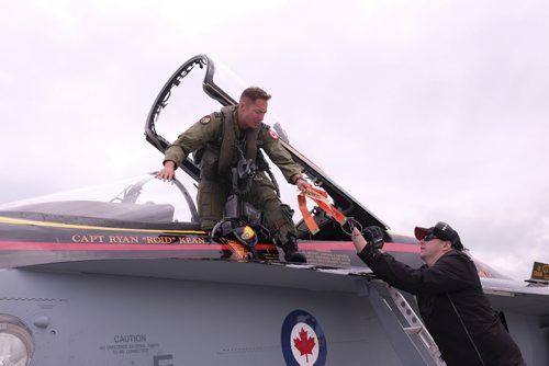 ZACHARY PRONG / WINNIPEG FREE PRESS  CF-18 Hornet pilot Captain Ryan Kean (L) and Sgt. Robert Gregory prepare for a practice flight at Southport Airfield on June 3, 2016.