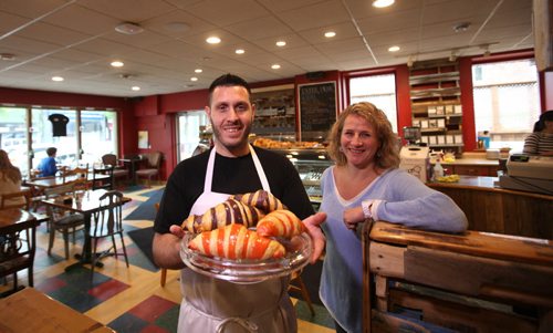 RUTH BONNEVILLE / WINNIPEG FREE PRESS Frenchway Café Bakery owner Larissa Webster and her pastry chef Emmanuel Baltaglia with his creation of the strawberry and blueberry croissant. Baltaglia is from France and was hired through an immigration program that the Conservatives scrapped in the fall of 2014 that the Liberals have just revived. See Carol Sanders story. June 03 / 2016