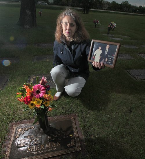 PHIL HOSSACK / WINNIPEG FREE PRESS - Cathy Sherman, daughter of the late Winnipeg MP, MLA and journalist Bud Sherman at the graveside of her parents.. See Gord Sinclair story. June 3, 2016