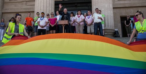 MIKE DEAL / WINNIPEG FREE PRESS Premier Brian Pallister speaks to the crowd gathered on the steps of the Manitoba Legislative Building before the start of the Pride Parade Sunday. 160605 - Sunday, June 05, 2016