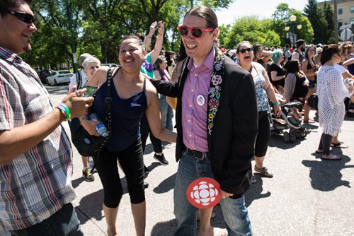 MIKE DEAL / WINNIPEG FREE PRESS Member of Parliament Robert-Falcon Ouellette takes part in the Pride Parade Sunday. 160605 - Sunday, June 05, 2016