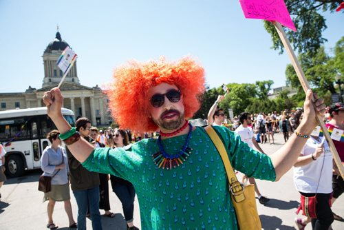 MIKE DEAL / WINNIPEG FREE PRESS Robert Lidstone takes part in the Pride Parade Sunday. 160605 - Sunday, June 05, 2016