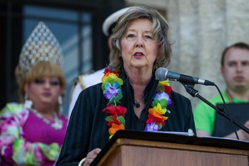 MIKE DEAL / WINNIPEG FREE PRESS Janice Filmon Lieutenant Governor of Manitoba speaks to the crowd gathered on the steps of the Manitoba Legislative Building before the start of the Pride Parade Sunday. 160605 - Sunday, June 05, 2016