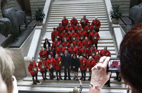 WAYNE GLOWACKI / WINNIPEG FREE PRESS      In front centre, Premier Brian Pallister and Heather Stefanson, Minister of Justice and Attorney General with members of the RCMP "D" Division who attended the Order of the Buffalo Hunt ceremony in the Manitoba Legislative Bld. Tuesday.  A total of 65 members were deployed to Fort McMurray at the height of the wildfires.  The Order of the Buffalo Hunt is the highest honour the province can bestow to individuals who have demonstrated outstanding skills in the areas of leadership, service and community commitment. Aidan Geary story.   June 7  2016