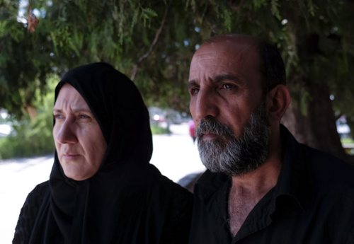 ZACHARY PRONG / WINNIPEG FREE PRESS  Khattab Omar Karim and his wife Tavga Ahmed outside of the Mount Karmel Clinic where a family friend is helping them cope with the murder of their son Mohammed Omar.