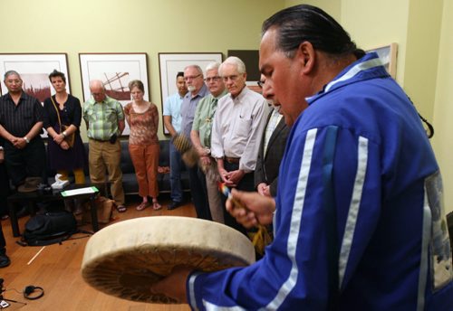 JOE BRYKSA / WINNIPEG FREE PRESS  Closing ceremony for the Winnipeg Hearing Centre where confidential hearing where done for survivors of Indian Residential Schools- 391 York St, 2nd Floor- Garry Dano plays a healing song on his drum at ceremony today - June 07 , 2016.(See Alex Paul  story)