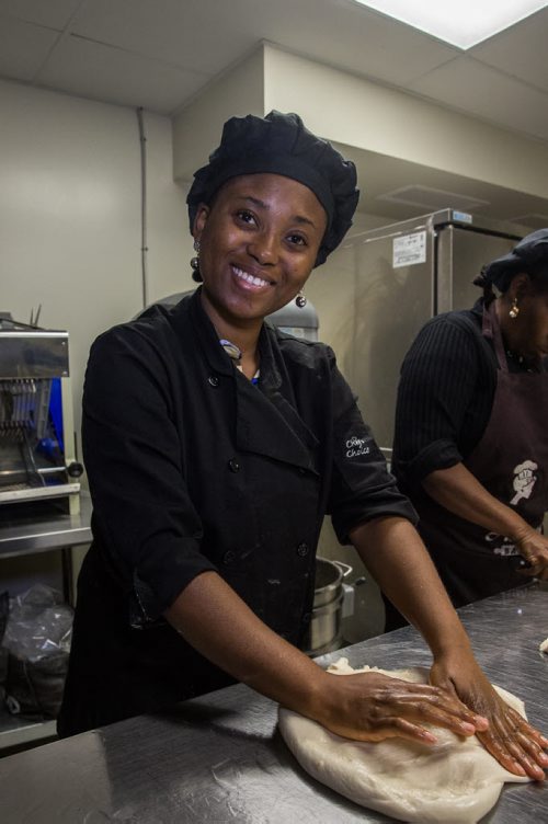 MIKE DEAL / WINNIPEG FREE PRESS Demi Akindipe prepares their special bread with the help of her mother Visi. Bryan and Temi Akindipe (pictured) are both from Nigeria - they met in Winnipeg about 10 years ago, while studying nursing at U of M. After getting married, Bryan missed the Agege bread he grew up with in Nigeria so he started fooling around in the kitchen, trying to recreate the bread his grandmother used to make. After nailing it, friends and family told him he should market it - not only to ex-pat Africans but Canadians, too. So he and his wife opened their own place in February, Arabelle's Bakery, 1284 Archibald Street. 160607 - Tuesday, June 07, 2016