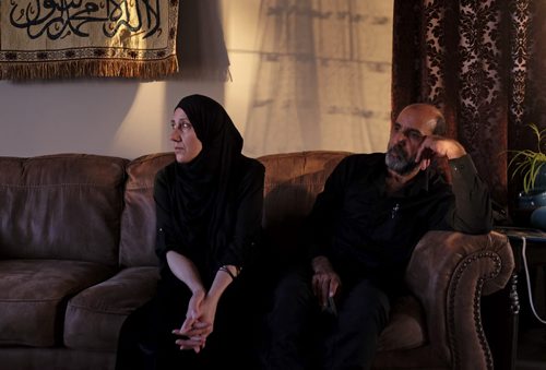 ZACHARY PRONG / WINNIPEG FREE PRESS  Tavga Ahmed and her husband Khattab Omar Karim at their home in Winnipeg on June 7, 2016. They have been devastated by the loss of their son Mohammed after he was murdered in Saskatoon on April 24, 2016.