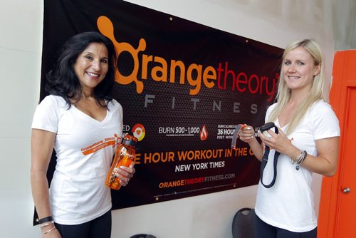 BORIS MINKEVICH / WINNIPEG FREE PRESS Orange Theory Fitness on Taylor Ave.  (L-R) Ruth Asper, owner, and Kathleen Skinner, owner/studio manager, are about to open up a new gym that's part of an American franchise, It offers group high intensity interval training in which participants watch each other's heart rates on giant television screens for all to see. The goal is to get into the "Orange Zone."  REPORTER - Shamona Harnett. June 8, 2016.