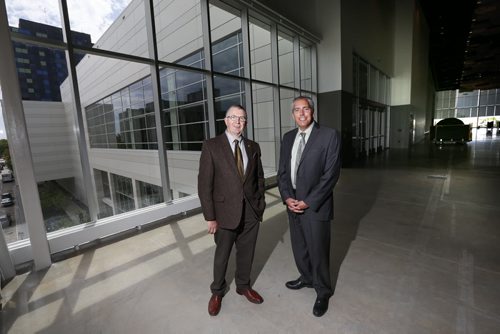 WAYNE GLOWACKI / WINNIPEG FREE PRESS     At left,  Klaus Lahr, president and CEO with David Chizda, Director of Sales and Business Development, both with the RBC Winnipeg Convention Centre in the City View Room in the new addition to the centre. This $181.6-million, three-year expansion project came in on time and on budget.  Murray McNeill story. June 8  2016
