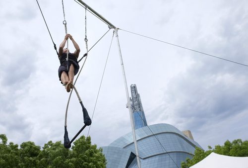 ZACHARY PRONG / WINNIPEG FREE PRESS  Rebecca Leonard of A Girl in the Sky sets up a trapeze on June 8, 2016 in preparation for Kidsfest which will take place from June 9-12 at the Forks. Leonard and her partner Rachel David will be running a swinging trapeze workshop for children ages 8 and up. Kidsfest will also include "big top" tents where families can enjoy theatre, music, story telling, dance and acrobatics.