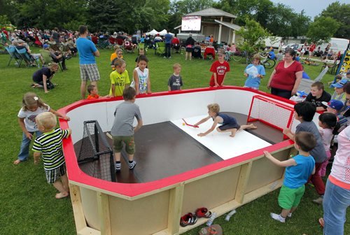 BORIS MINKEVICH / WINNIPEG FREE PRESS Winkler, MB - HOCKEY NIGHT IN WINKLER - Pittsburgh Penguin Eric Fehr has a hometown Stanley Cup party in Bethel Heritage Park. Here is one of the many things set up for the kids to play in the park while others watch the game on the big screen.  June 9, 2016.