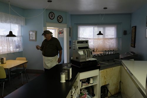 ZACHARY PRONG / WINNIPEG FREE PRESS  "Cookie" Simon Daintree, an employee at Cafe 1958 on Westminster Ave., waits for customers on June 9, 2016.