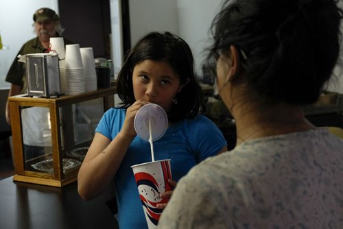 ZACHARY PRONG / WINNIPEG FREE PRESS  Grace Jeffers, 11, Ross's daughter, drinks her vanilla milkshake at Cafe 1958 on on June 9, 2016.