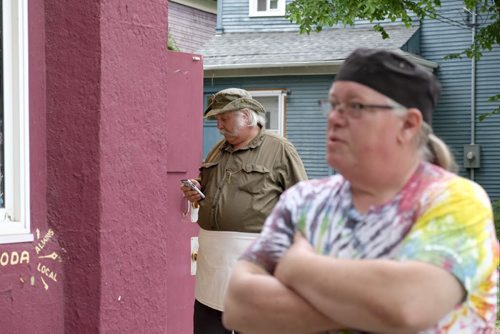 ZACHARY PRONG / WINNIPEG FREE PRESS  (L-R) "Cookie" Simon Daintree and Ross Jeffers wait for customers outside of  Cafe 1958 on on June 9, 2016.