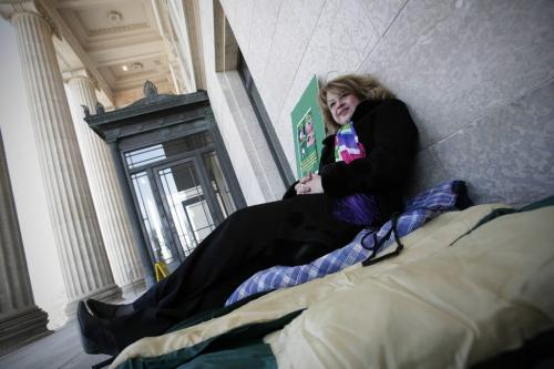 John Woods / Winnipeg Free Press / April 6, 2008 - 080406  - Tricia Kell sits on her sleeping bag on the steps of the Legislature after a press conference in Winnipeg Sunday April 6, 2008.  Kell says she is planning to sleep on the steps of the Manitoba Legislature unless something is done for her mentally ill daughter Tammy.  Kell says that she has been told that her daughter is beyond the system and her unique case falls between the services of the  Health and Family Services programs.
