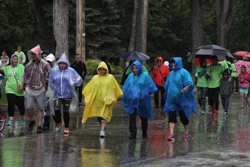 MIKE DEAL / WINNIPEG FREE PRESS  Despite the steady rain and a little thunder a few hundred dedicated people start the 10km RBC Cruisin Down the Crescent walkathon Sunday morning along Wellington Crescent. The fundraising event for The Childrens Rehabilitation Foundation is one of four major fundraisers that the CRF puts on to raise funds for the Rehabilitation Centre for Children to purchase specialized equipment for children and youth living with disabilities and special needs such as ipads, adapted and modified bicycles, walkers and wheelchairs.   160612 Sunday, June 12, 2016