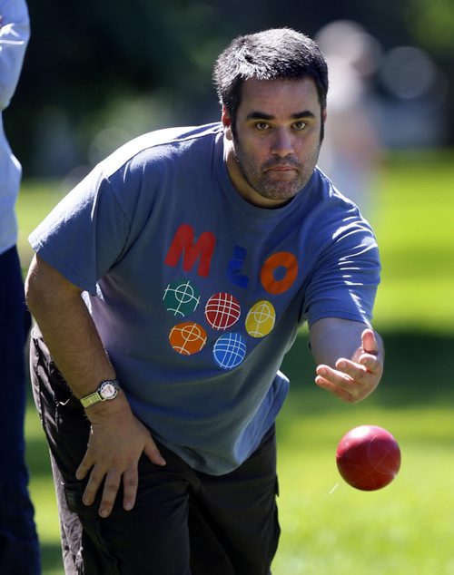 WAYNE GLOWACKI / WINNIPEG FREE PRESS     Special Olympics Manitoba athlete David Robinson tosses a ball during a game of bocce ball on the lawn of the Manitoba Legislative bld. Monday morning. This was part of the events that began earlier with a Law Enforcement Torch Run from City Hall to the Legislative grounds to kick off Special Olympics 2016 Awareness Week with this year message "Accept With No Exception".    June 13  2016