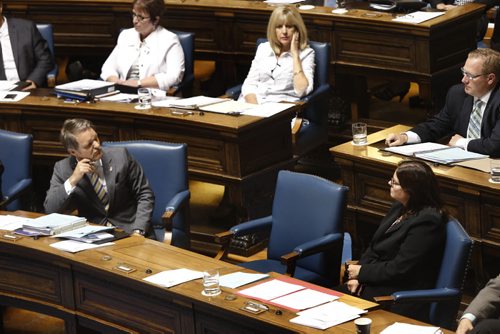 WAYNE GLOWACKI / WINNIPEG FREE PRESS    Premier Brian Pallister's empty chair between Heather Stefanson, Minister of Justice and Attorney General and Cameron Friesen Minister of Finance during question period Monday.  Kristin Annable story    June 13  2016