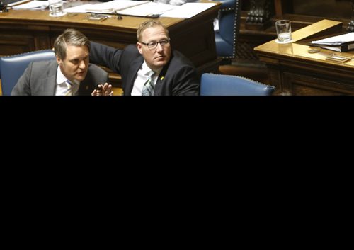 WAYNE GLOWACKI / WINNIPEG FREE PRESS     Scott Fielding, Minister of Families leans against the arm of Premier Brian Pallister's empty chair listening to Cameron Friesen Minister of Finance at the conclusion of question period Monday. At right is Heather Stefanson, Minister of Justice and Attorney General.  Kristin Annable story    June 13  2016