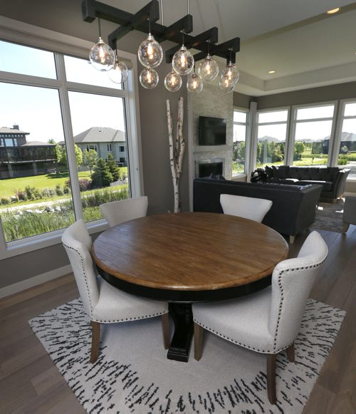 WAYNE GLOWACKI / WINNIPEG FREE PRESS    Homes.   10 Willow Landing in Pritchard Farm Southlands Village. Dining room in the great room with a view.¤ Irwin Homes rep is Andrew Koop. Todd Lewys story    June 13  2016
