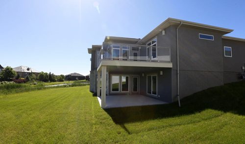 WAYNE GLOWACKI / WINNIPEG FREE PRESS    Homes.   10 Willow Landing in Pritchard Farm Southlands Village. A view of the back of the home.¤ Irwin Homes rep is Andrew Koop. Todd Lewys story    June 13  2016