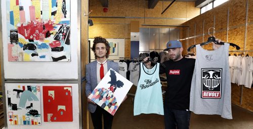 WAYNE GLOWACKI / WINNIPEG FREE PRESS     The Downtown Biz is launching their 4th Launch It! Retail Incubator program. At left, Josiah Koppanyi, artist,  with some of his work and Eric Olek with some of his Friday Knights brand shirts he is selling, they are two of the three entrepreneurs that have been selected for the space available in the Warehouse One space at Portage Ave and Carleton St.    Alex De Pape¤story    June 14  2016