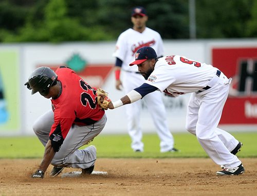 PHIL HOSSACK / WINNIPEG FREE PRESS -  Goldeye second baseman #9 Casio Grider tags Texas Airhog #23 Burt Reynolds Tuesday evening at CanWest park. Reynolds was called safe on the play. See story. June 14, 2016
