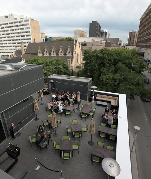 PHIL HOSSACK / WINNIPEG FREE PRESS -   The Met Rooftop patio - This is for an Intersection piece on rooftop patios all over town... The Met was recently named one of the country's Top 12 rooftop patios by the Food NetworkSee Dave Sanderson's story. June 14, 2016