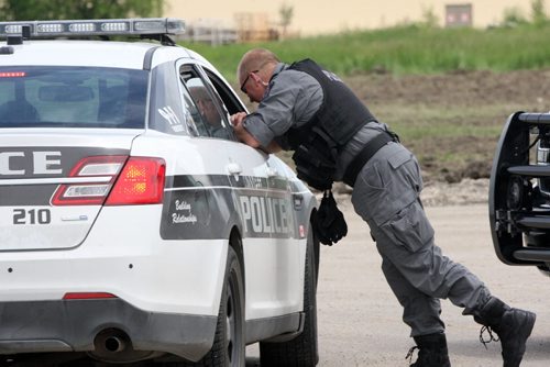 JOE BRYKSA / WINNIPEG FREE PRESS Police investigate possible firearm discharge in parking lot east of Sobeys on Taylor Tuesday, -June 15, 2016   -(See story)