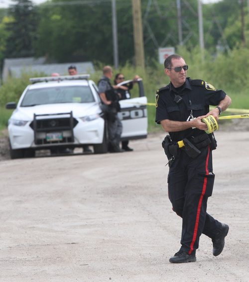 JOE BRYKSA / WINNIPEG FREE PRESSPolice are securing a area Tuesday afternoon on the east side of Taylor Ave at the Sobeys- The was a report of a person with a gun in the area earlier , June 15, 2016  -(See story)