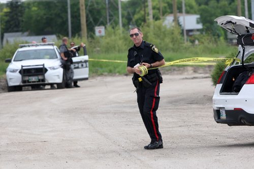 JOE BRYKSA / WINNIPEG FREE PRESS Police are securing a area Tuesday afternoon on the east side of Taylor Ave at the Sobeys- The was a report of a person with a gun in the area earlier , June 15, 2016  -(See story)