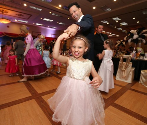 JASON HALSTEAD / WINNIPEG FREE PRESS  L-R: Mike Foote dances with his daughter Claire, 4, at the Childrens Hospital Foundation of Manitobas Father-Daughter Ball at the Victoria Inn Hotel and Convention Centre on June 9, 2016. (See Social Page)