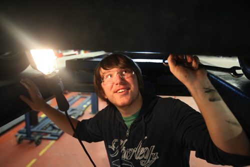 RUTH BONNEVILLE / WINNIPEG FREE PRESS  2017 Project: Grade 11 student Garrett, examines the undercarriage of a vehicle that needs repair work in his Power Mechanics class at Glen Lawn School.   Garrett is one of a group of students from Windsor School that the Free Press has been following since kindergarden.    See Doug Speirs story.    June 15 / 2016