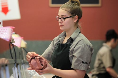 RUTH BONNEVILLE / WINNIPEG FREE PRESS  2017 Project: Grade 11, Glen Lawn student, Mackenzie, spends her spare time working at Millers Meats.  She is one of a group of students from Windsor School that the Free Press has been following throughout their school years.    See Doug Speirs story.   June 15 / 2016