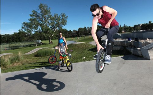 PHIL HOSSACK / WINNIPEG FREE PRESS -  Jared Halpin (centre) shows off a jump for Dave Sanderson's story. June 15, 2016