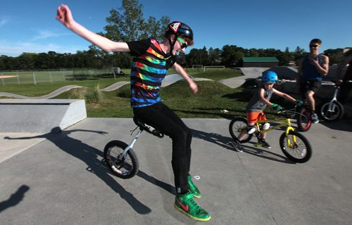 PHIL HOSSACK / WINNIPEG FREE PRESS -   UnicyclistLouis Stevens comes down hard for Dave Sanderson's story. June 15, 2016