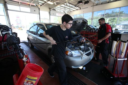 RUTH BONNEVILLE / WINNIPEG FREE PRESS  2017 Project: Grade 11, Glen Lawn student Thomas, learns how to service vehicles for work experience at the Great Canadian Oil company.   He is one of a group of students from Windsor School that the Free Press has been following throughout his school years.       See Doug Speirs story.   June 15 / 2016