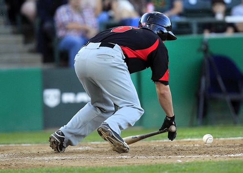 PHIL HOSSACK / WINNIPEG FREE PRESS -   Texas Air Hog #6 Will Dupont falls to the ground after Winnipeg Goldeye's pitcher #26 Mikey O'Brian knocked him down with an errant pitch in the 5th inning. O'Brian knocked more than one Hog batter down. See story. June 15, 2016