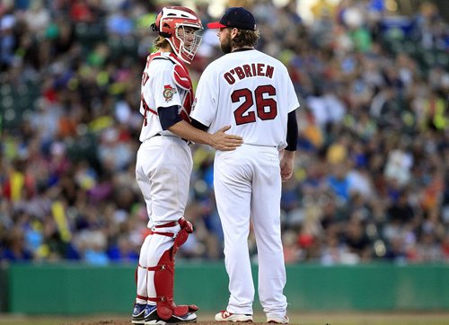 PHIL HOSSACK / WINNIPEG FREE PRESS -    Winnipeg Goldeye catcher Tanner Murphy and pitcher Mikey O'Brienrien knocked another of several Texas Air Hogs down with an errant pitch Wednesday.  See story. June 15, 2016