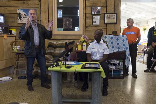 ZACHARY PRONG / WINNIPEG FREE PRESS  Sel Burrows, left, the chair of the North Point Douglas Residents Committee gives a speech at an event honking outgoing Winnipeg Chief of Police Devon Clunis on June 16, 2016.