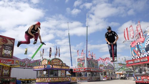 ZACHARY PRONG /  WINNIPEG FREE PRESS  Daniel Mahoney, left, and Harry White, Xpoogo athletes, practice their moves at the Red River Ex before opening day. They will be performing at the Red River Ex which runs from June 17 to June 26, 2016.