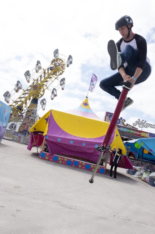 ZACHARY PRONG /  WINNIPEG FREE PRESS  Harry White, an Xpoogo athlete, practices his moves at the Red River Ex before opening day. Him and his team will be performing at the Red River Ex which runs from June 17 to June 26, 2016.