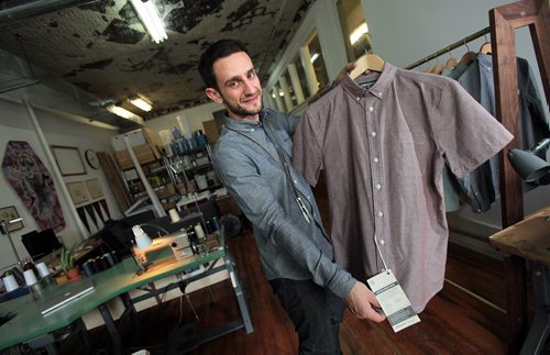 PHIL HOSSACK / WINNIPEG FREE PRESS -  THREADS -  Andrew Doerksen shows off one of the shirts he makes by hand for Commonwealth Clothing in his downtown studio. See Connie Tamamoto's story. June 16, 2016